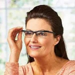A woman wearing Flex Vision glasses